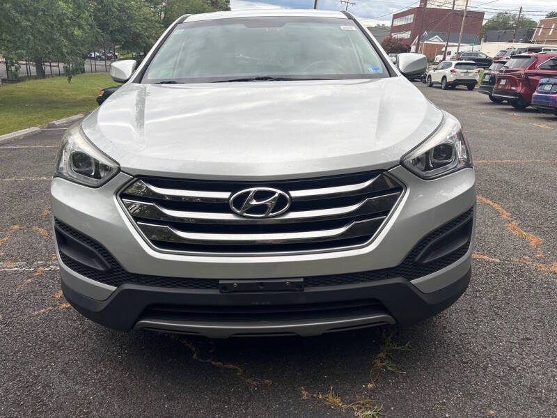 hyundai santa fe 2015 5XYZTDLB7FG252141 image hyundai santa fe 2015 5XYZTDLB7FG252141 image